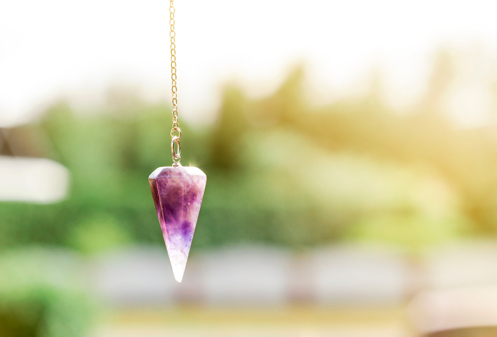 Amethyst crystal pendulum.